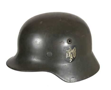 German Third Reich 1939 Army Double Decal Steel Helmet.  A scarce rolled edge example with Army eagle to the left side (50% p