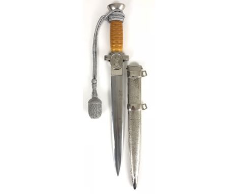 German Third Reich Red Cross Social Welfare Leader's dagger.  Good scarce heavily plated example with amber grip, oval eagle 