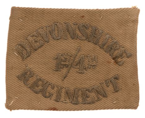 1st/4th Battalion Devonshire Regiment WW1 Foreign Service Helmet cloth pagri badge.  Good scarce KD rectangle embroidered in 