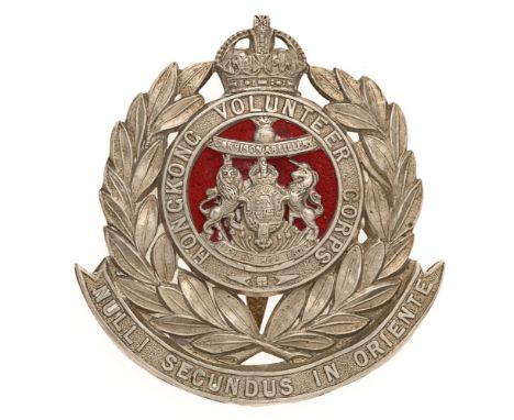 Hong Kong Volunteer Corps Edwardian Garrison Artillery helmet badge c.1902-08.  Good RARE die-stamped British made white meta