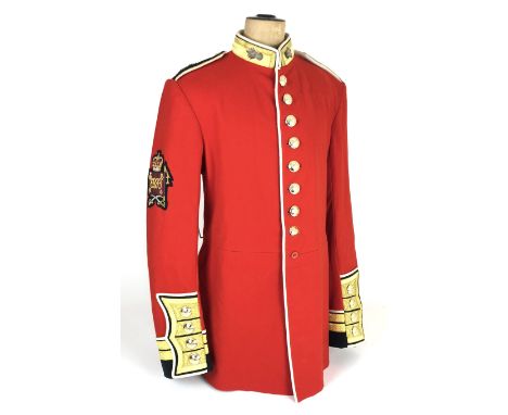 Grenadier Guards Warrant Officer's pattern tunic.  A very good bright example. Scarlet cloth with blue facings to the cuff, c