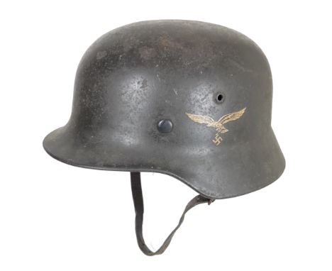 German Third Reich 1939 Luftwaffe Double Decal Steel Helmet.  A scarce rolled edge example with Luftwaffe eagle to the left s