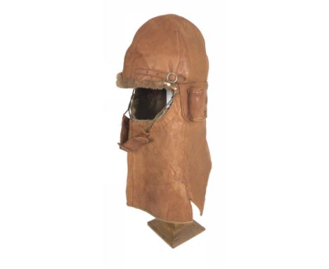RFC Cowl pattern flying helmet, near unissued condition.  Very good example of the type. The helmet is of soft brown leather 