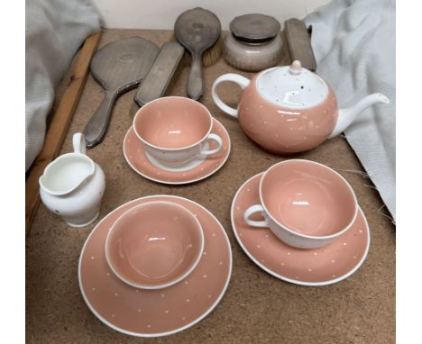 A Susie Cooper part tea service together with a silver backed part dressing table set