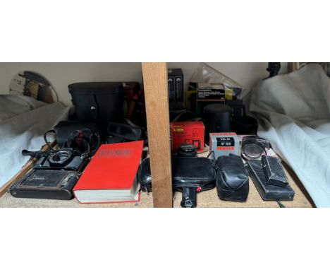 A Pentax camera together with other cameras, lenses and accessories etc 