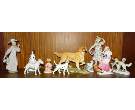 A Royal Doulton sculpture "The Retriever" DA112, three other dog figures, a Lladro figurine "Hello Friend" (boxed), a Royal D