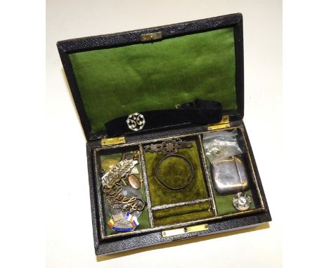 A silver Vesta case, Birmingham 1902, a serpentine-mounted compass fob and other items in a jewellery case. 