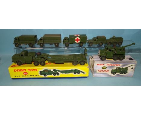 Dinky Toys, 661 Recovery Tractor, 660 Tank Transporter, (both boxed) and five Dinky Army diecasts, (7). 