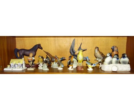 A collection of ten Goebel bird sculptures, (Pheasant a/f), a Goebel 'Drummer Boy', a Beswick Arab 'Xayal' horse on wooden pl