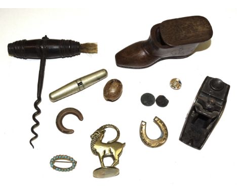 A 19th century mahogany shoe snuff box with brass pin decoration to sole, toe, sides and back, with sliding lid, 9cm long, 4.