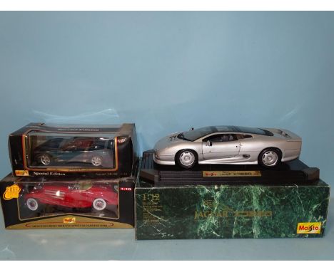 Maisto, a 1/12 scale 1992 Jaguar XJ220, (boxed, mint), a 1:18 scale Mercedes Benz 500K TYP Special Roadster (1936) and a 1:18
