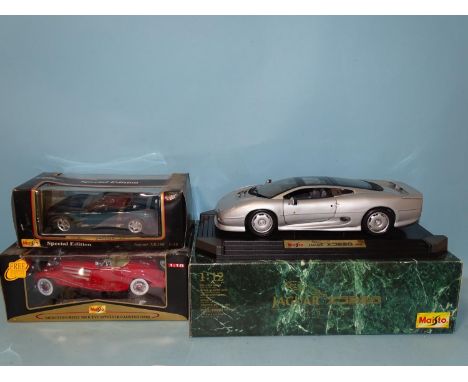 Maisto, a 1/12 scale 1992 Jaguar XJ220, (boxed, mint), a 1:18 scale Mercedes Benz 500K TYP Special Roadster (1936) and a 1:18