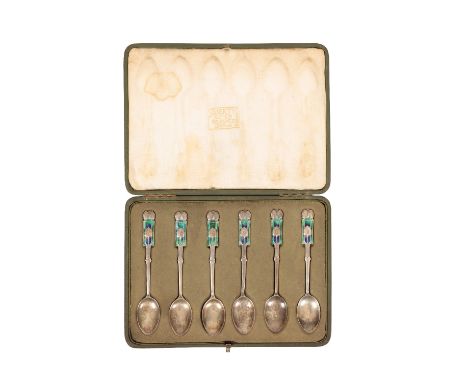 ARCHIBALD KNOX FOR LIBERTY &amp; CO: A SET OF SIX "CYMRIC" ART NOUVEAU SILVER AND ENAMEL SPOONS, Birmingham, 1904, the finial