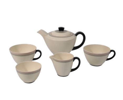 POOLE POTTERY: AN ART DECO "EVEREST" BACHELORS TEA SET, designed by John Adams, comprising teapot, milk jug, sugar bowl, and 