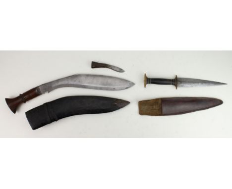 Knives: 1) An African dagger, blade 6.75" with diamond type decoration. In a plain leather sheath. 2) A decent Indian Kukri, 