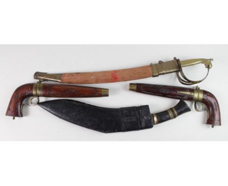 Indian Tourist items: 1) A pair of pistol shaped decorative knives in carved wooden scabbards. Good condition. 2) Brass handl