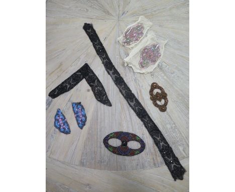 Two pairs of beaded epaulettes, two jet collars and two bead work buckles, some losses to long jet collar but generally good 