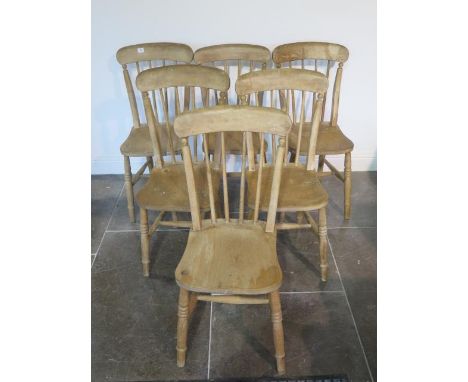 A set of six Victorian stick back ash and elm kitchen chairs, all generally sturdy, 