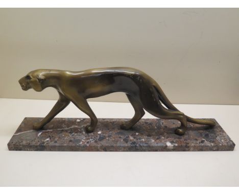 An Art Deco painted figure of a panther on a marble base, signed M Font, 16cm tall x 48cm wide, some small paint loss but in 