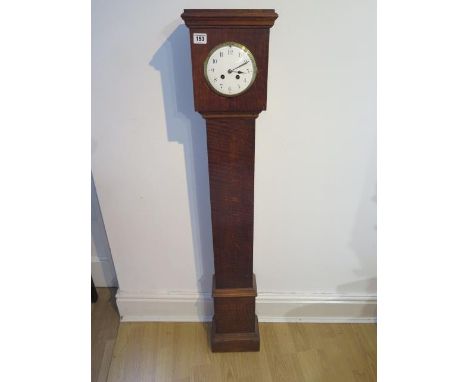 An oak case 8 day granddaughter clock with French striking movement - Height 126cm - cracks to dial but running 