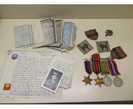 A Burma star medal group, four medals with letters and 17th Indian and 14th Army cloth Divisional patches, some letters are c