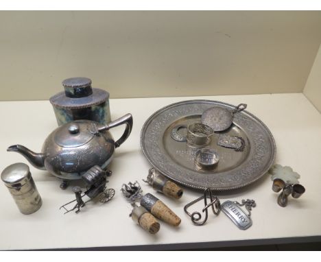 A Chinese silver rickshaw, three assorted bottle stoppers, a Lama salt and assorted plated items including a caddy 