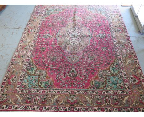 A multi coloured ground vintage hand woven Persian woollen Tabriz rug with all over floral pattern with mint green colour, 27