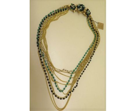 A vintage designer Francoise Montague of Paris gilt pearl and bead necklace with original label, 70cm long, in good condition