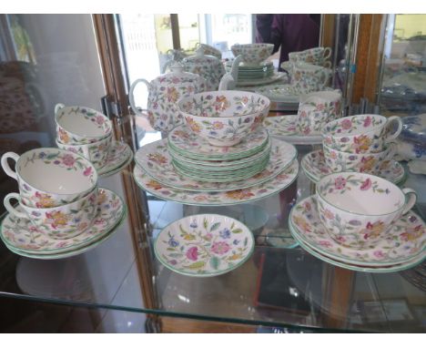 A Minton Haddon Hall 8 setting tea set with two sandwich plates and two side dishes - missing one cup, small chip to base of 