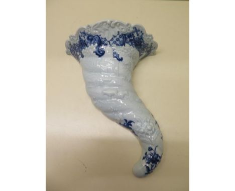 A high quality well modelled 18th century Worcester porcelain blue and white cornucopia embossed decorated with a park landsc