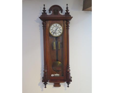 A 19th century double weight wall clock by Gustav Becker with two piece dial, 115cm tall, in running order, generally good 