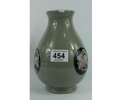 Moorcroft trial vase decorated with panels of roses height 19cm