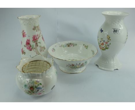 A collection of boxed Aynsley items to include limited edition Diamond vase 2001, Elizabeth Rose vase, Wild Tudor Rose bowl a
