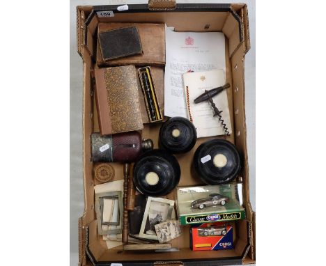 A collection of mixed items to include crown green bowls, hard back books, hip flask, victorian corkscrew, commemorative item