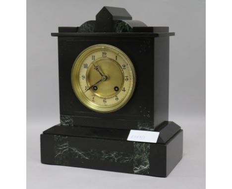 A slate mantel clock with key and pendulum height 29cm