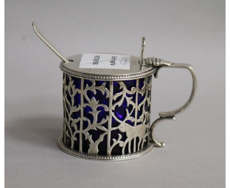 A Victorian pierced silver drum mustard, London, 1846 and a silver mustard ladle.
