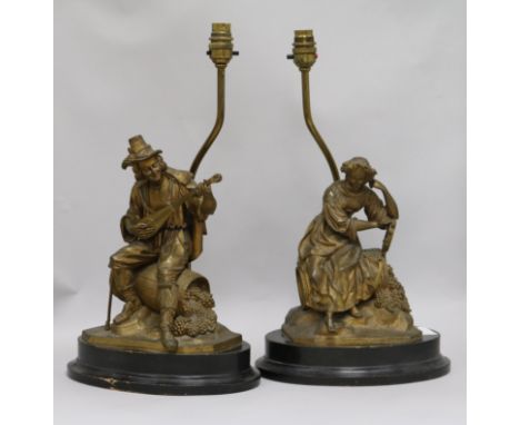 A pair of spelter figural lamp bases, height 47cm