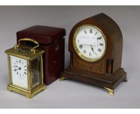 A mantel clock and a cased timepiece clock height 18cm