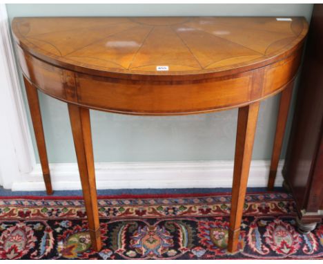 An Edwardian inlaid satinwood card table W.100cm