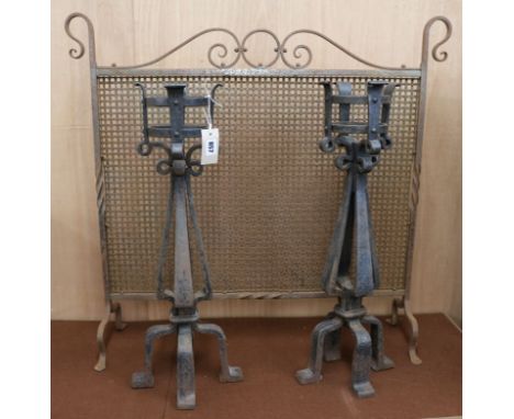 A pair of wrought iron firedogs and firescreen W.85cm