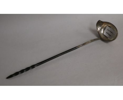 A George III silver toddy ladle, with baleen handle, 37.3cm.