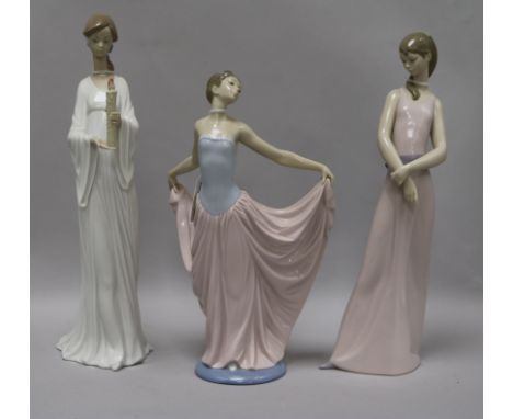 A Lladro figure, Dancer, No. 5050 and two other figures, The Lady of the Rose, No. 6857 (rose missing) and Light and Life, No