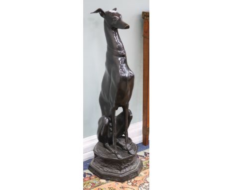 A pair of bronze hounds W.25cm (at base)