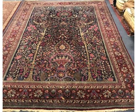 A large Tabriz carpet 460cm x 318cm