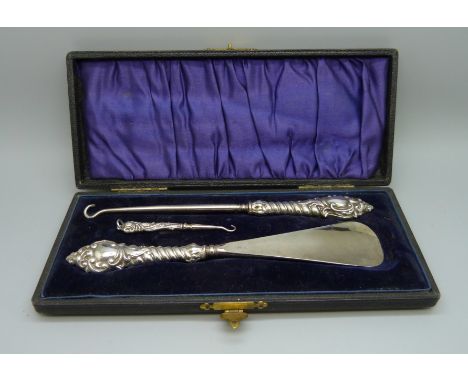 A silver button hook and shoe horn set, cased, Birmingham 1901 