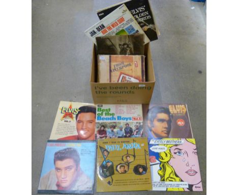 A box set of eight Beatles LPs and 30 LPs from 1960s artists including The Rolling Stones, Elvis Presley, Beach Boys, etc. 