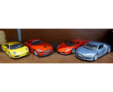 Three Maisto model vehicles and a Motormax Toy Factory Mercedes, Ferrari a/f 