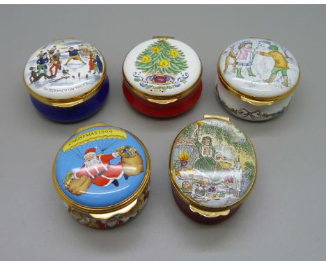 Four Harrods Crummles enamel Christmas trinket boxes and one Halcyon Days enamel Christmas trinket box 