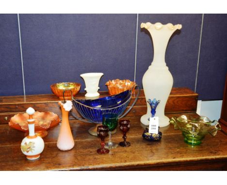 A quantity of decorative coloured glass, to include Moser style blue glass scent bottle, blue glass comport, carnival glass, 