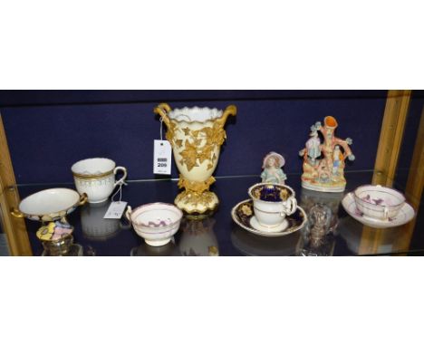 A Coalport gilt decorated vase, on cream ground, 20cm high, together with cabinet cups and saucers, moustache cup, tea cosy f